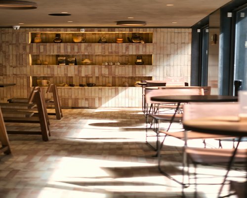 Sunlight streaming through sheer curtains illuminating a cozy indoor space in Mexico